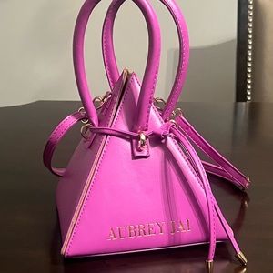 Aubrey x Jai pyramid bag.